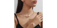 Perle Stellaire – Ensemble Collier, Bracelet et Boucles d'Oreilles Perle Stellaire – Ensemble Collier, Bracelet et Boucles d'Oreilles